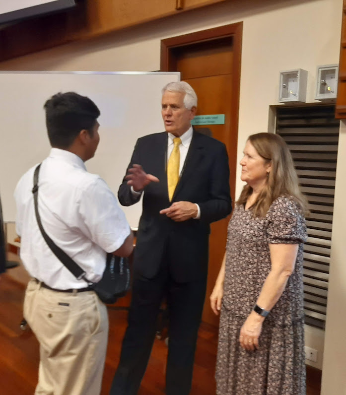 A missionary with Elder and Sister Jackson